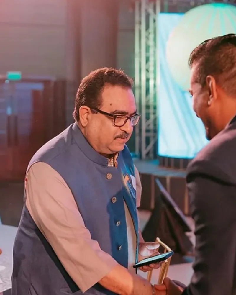 Two industry leaders greeting each other warmly